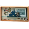 Waddell Specialty Memento Display Case filled with veteran memorabilia on a white background