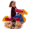 Young Child riding on a playground toy