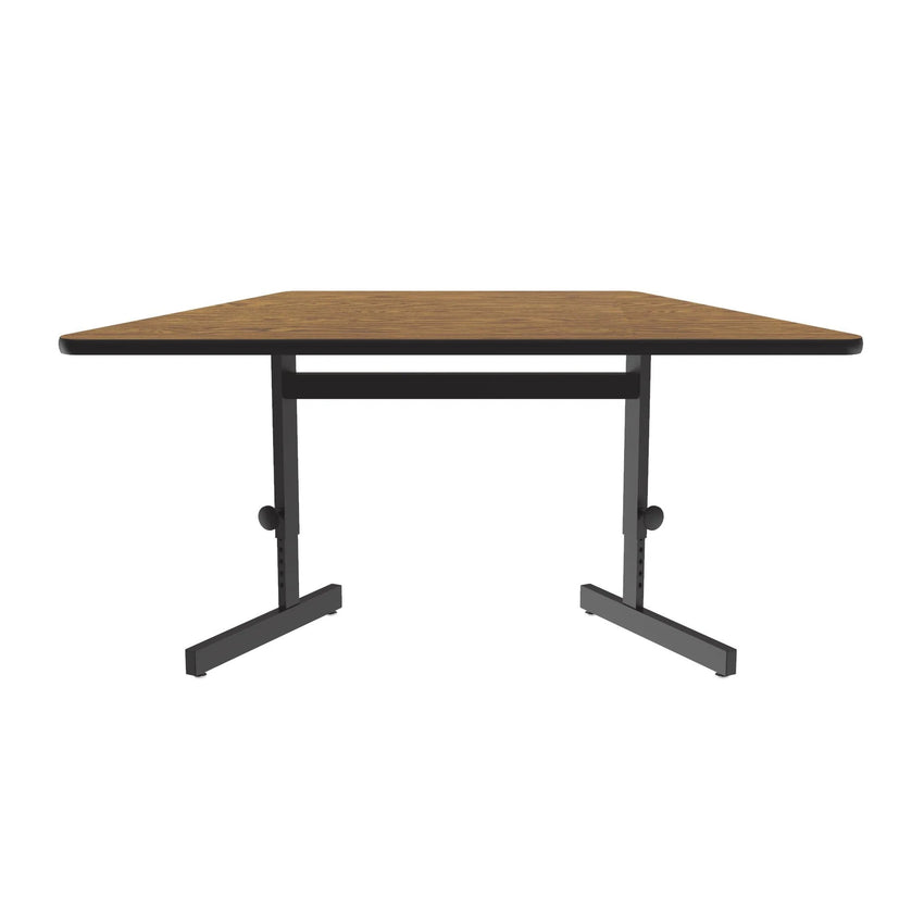 Correll Trapezoid Adjustable Height Deluxe High - Pressure Top, Trapezoid, Computer/Student Desks 30"W x 60"L x 21 - 29"H Adjustable Height (COR - CSA3060TR - XX) - SchoolOutlet